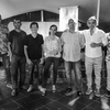 Photographers of Photo exhibition posing at Flic en Flac