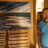 Tapan Gandhi and his photo taken at Gris Gris during photo exhibition at Les Robinsons