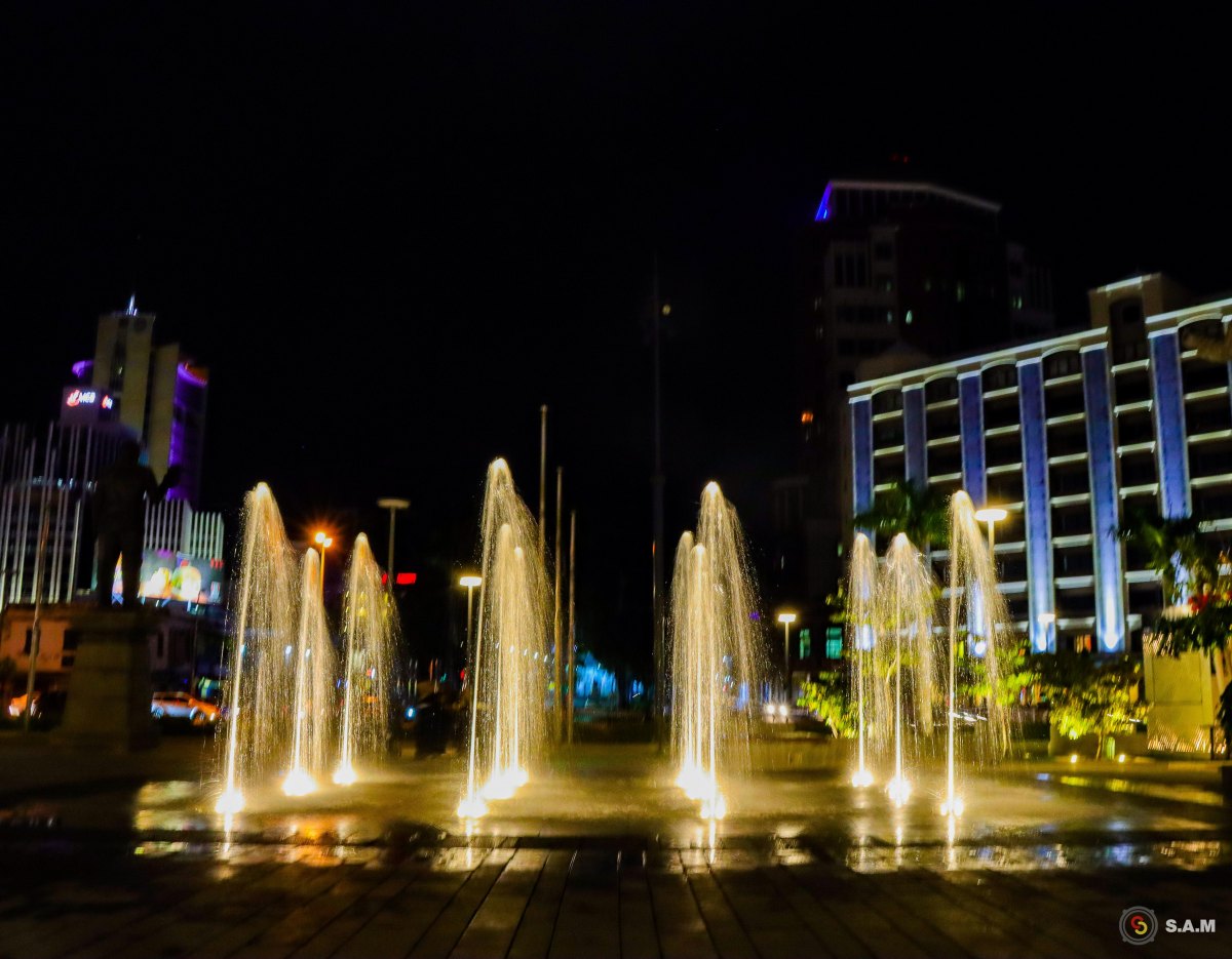 100+ Free Photos - Illuminating water jet at night at Port Louis Waterfront