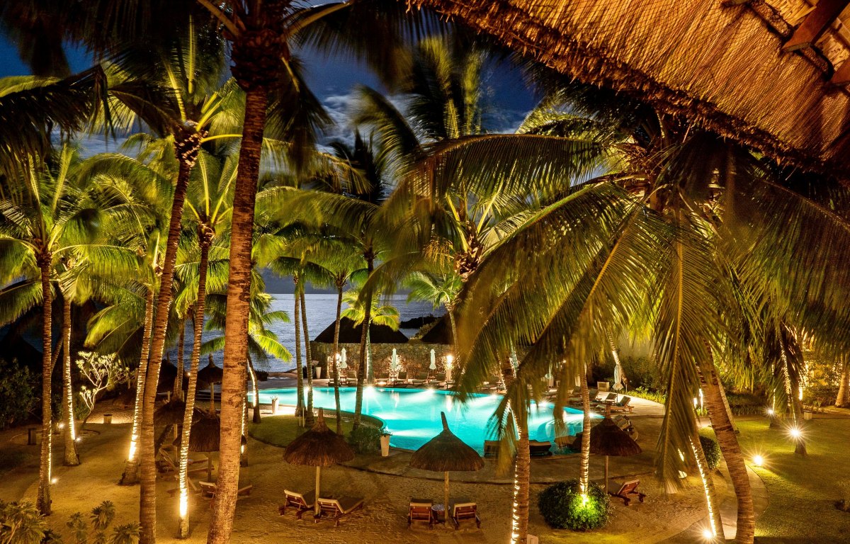 100+ Free Photos - Pool behind coconut trees at night Mauritius